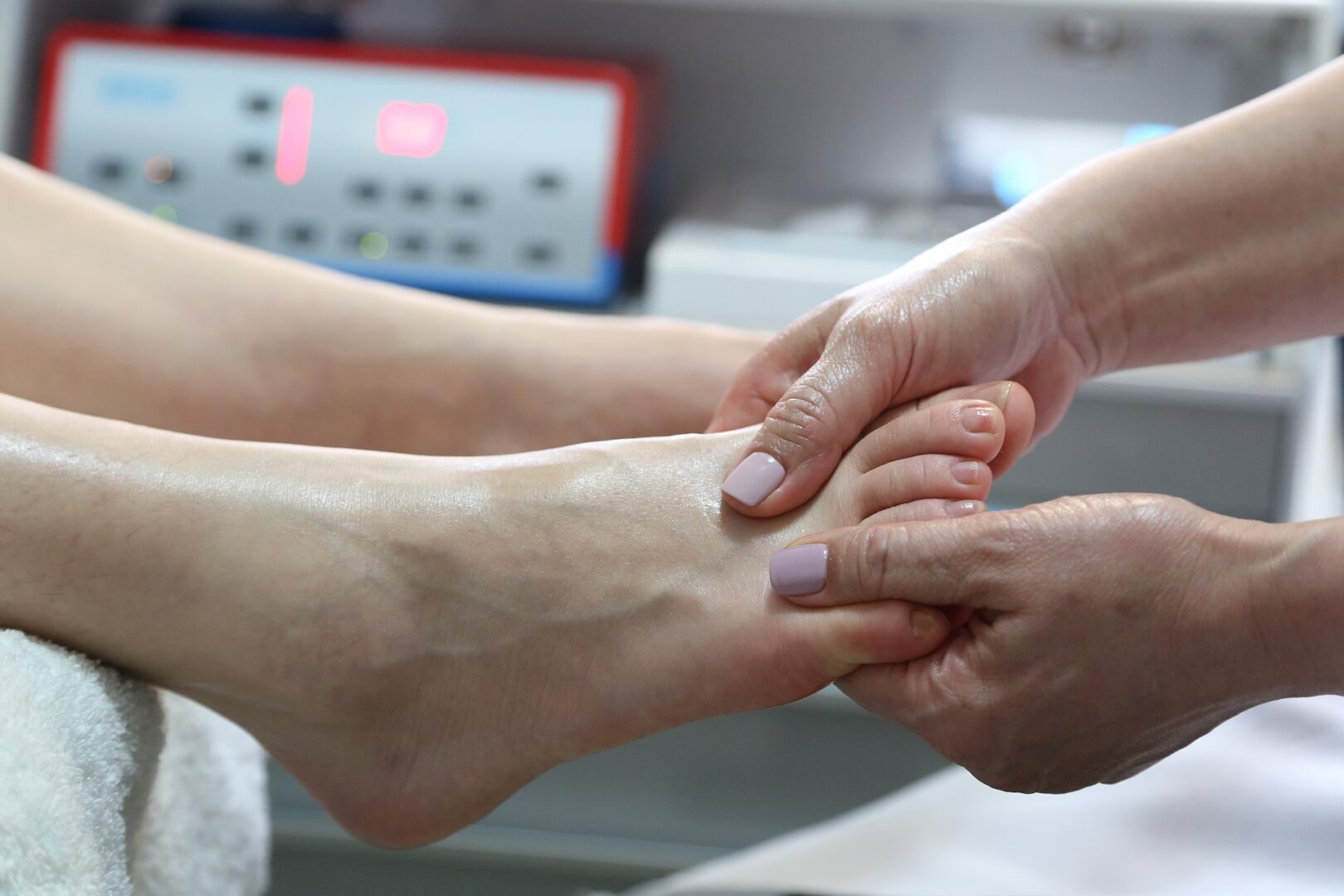 A person is getting their foot massage